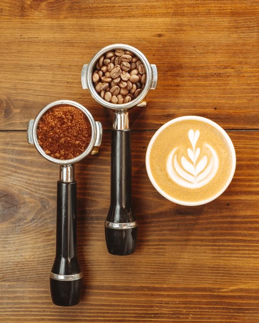 Coffee brewing tools arranged on a wooden table